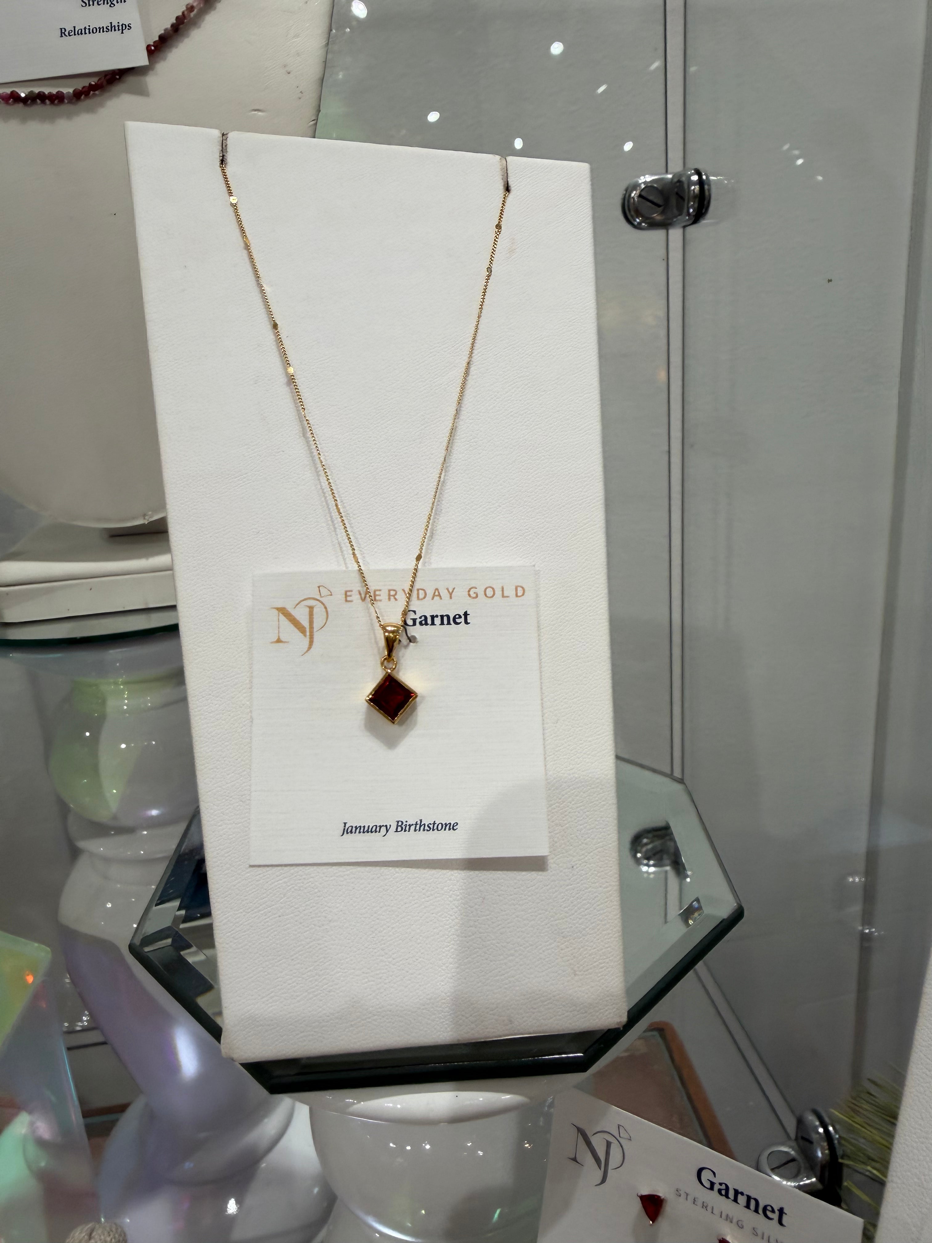 Garnet gold necklace