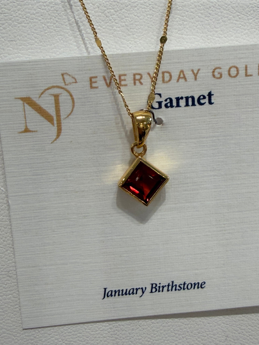 Garnet gold necklace