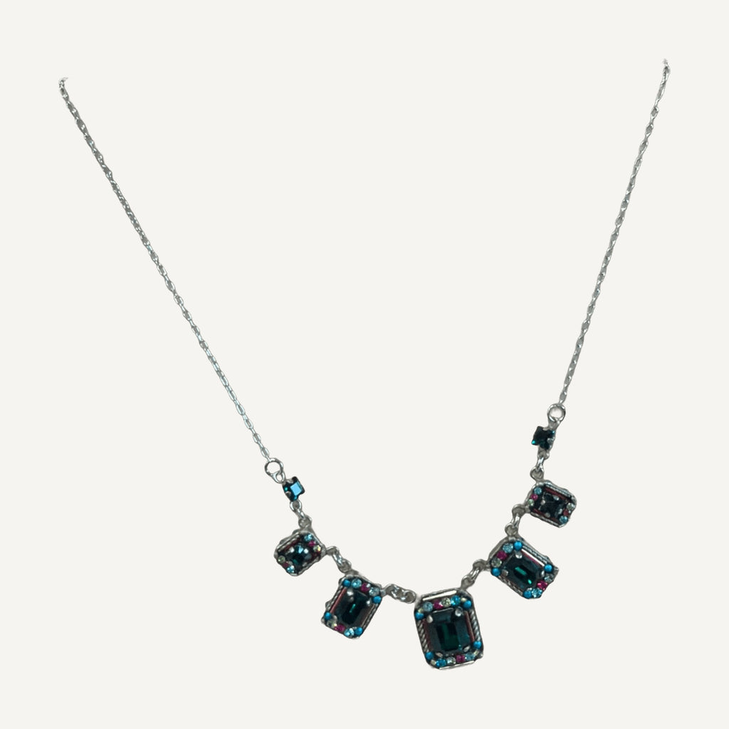 Emerald green crystal five-station mosaic necklace on a wooden bust