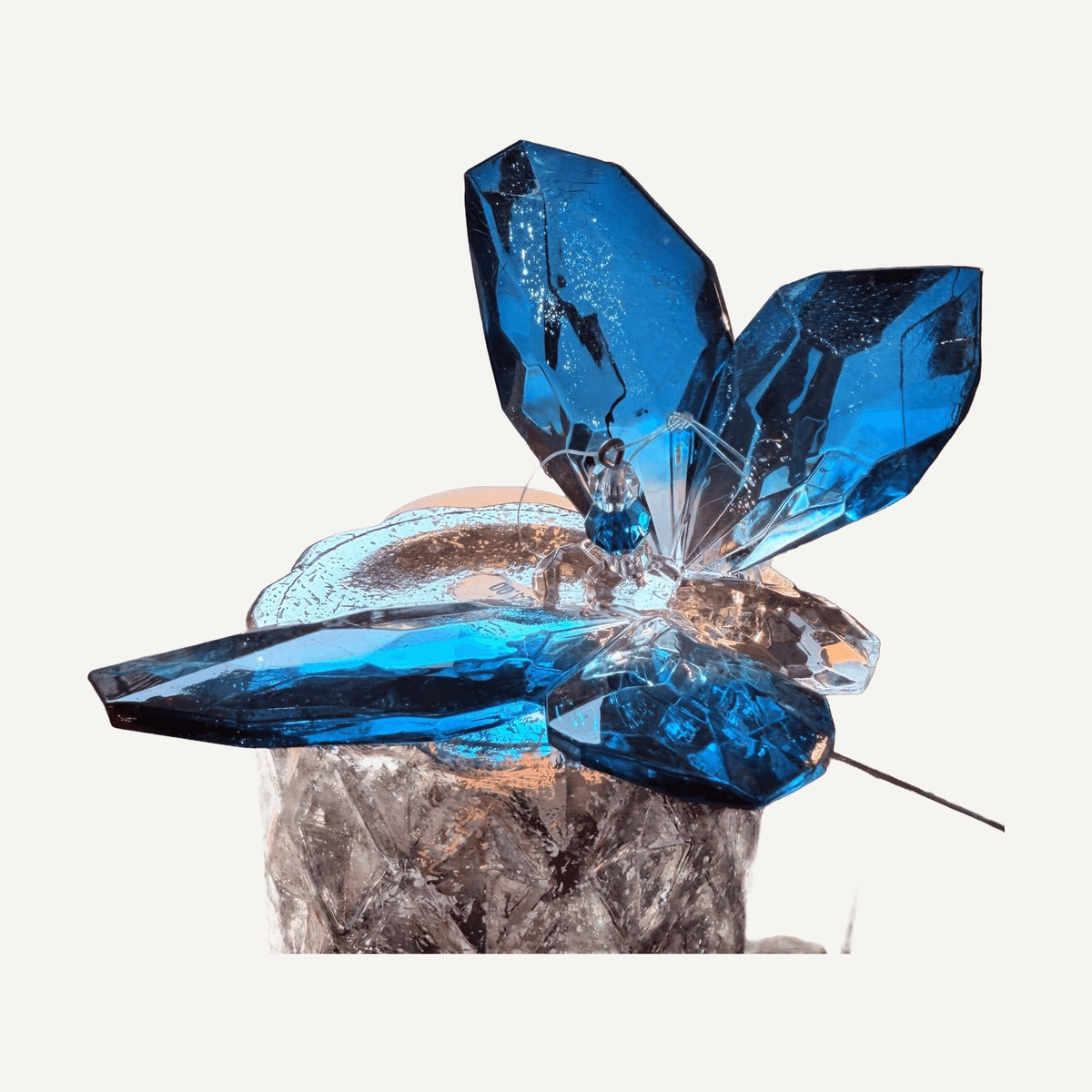 Blue faceted crystal butterfly with clear body