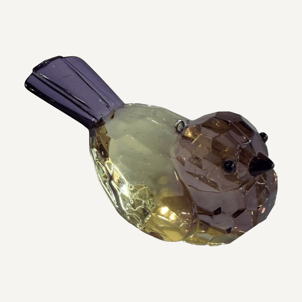 Purple and golden yellow faceted crystal songbird