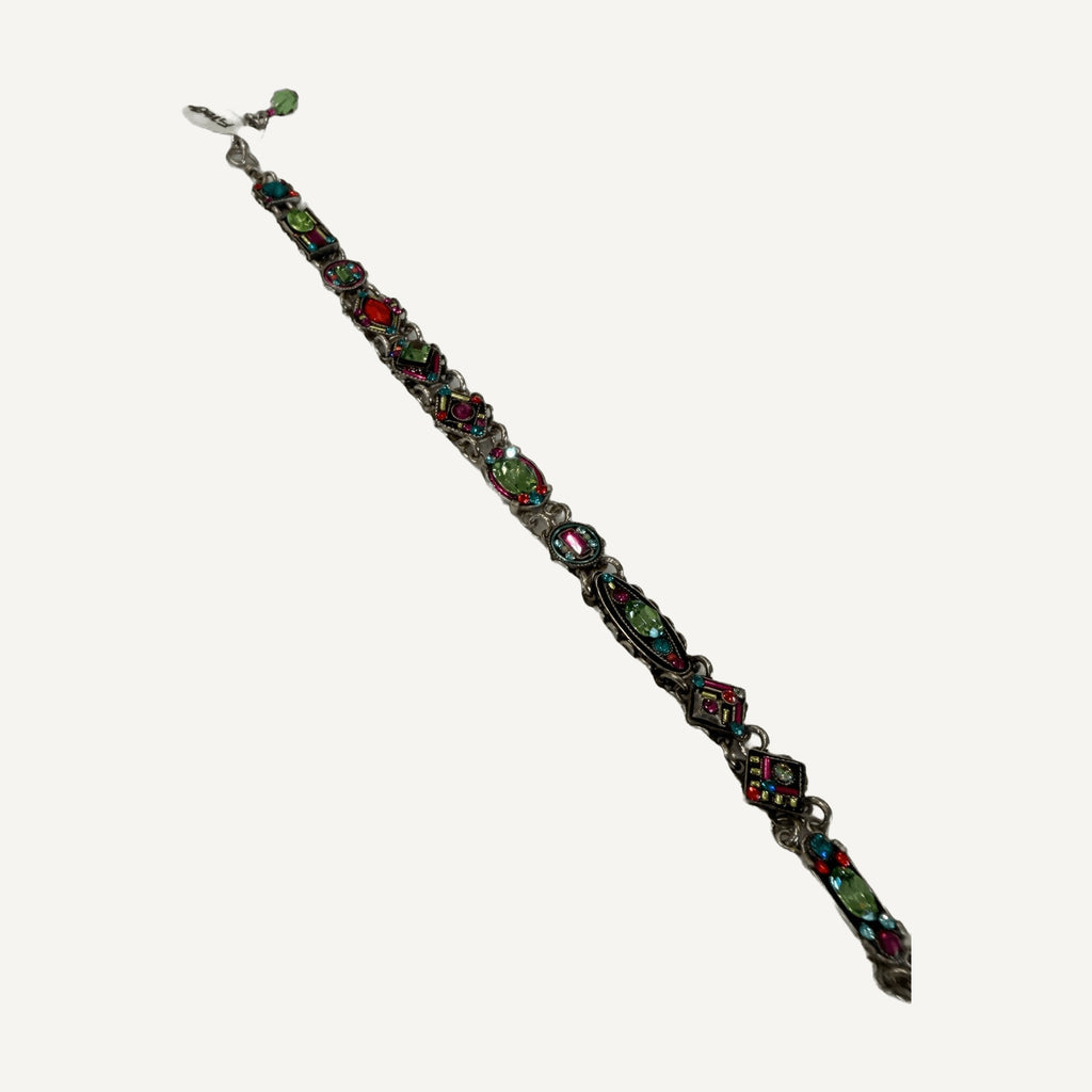 Angled view of green and pink crystal mosaic links